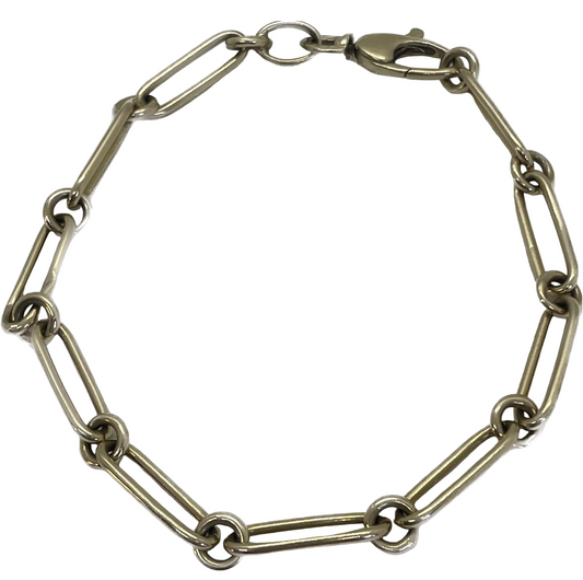 Gold chain bracelet on a white background