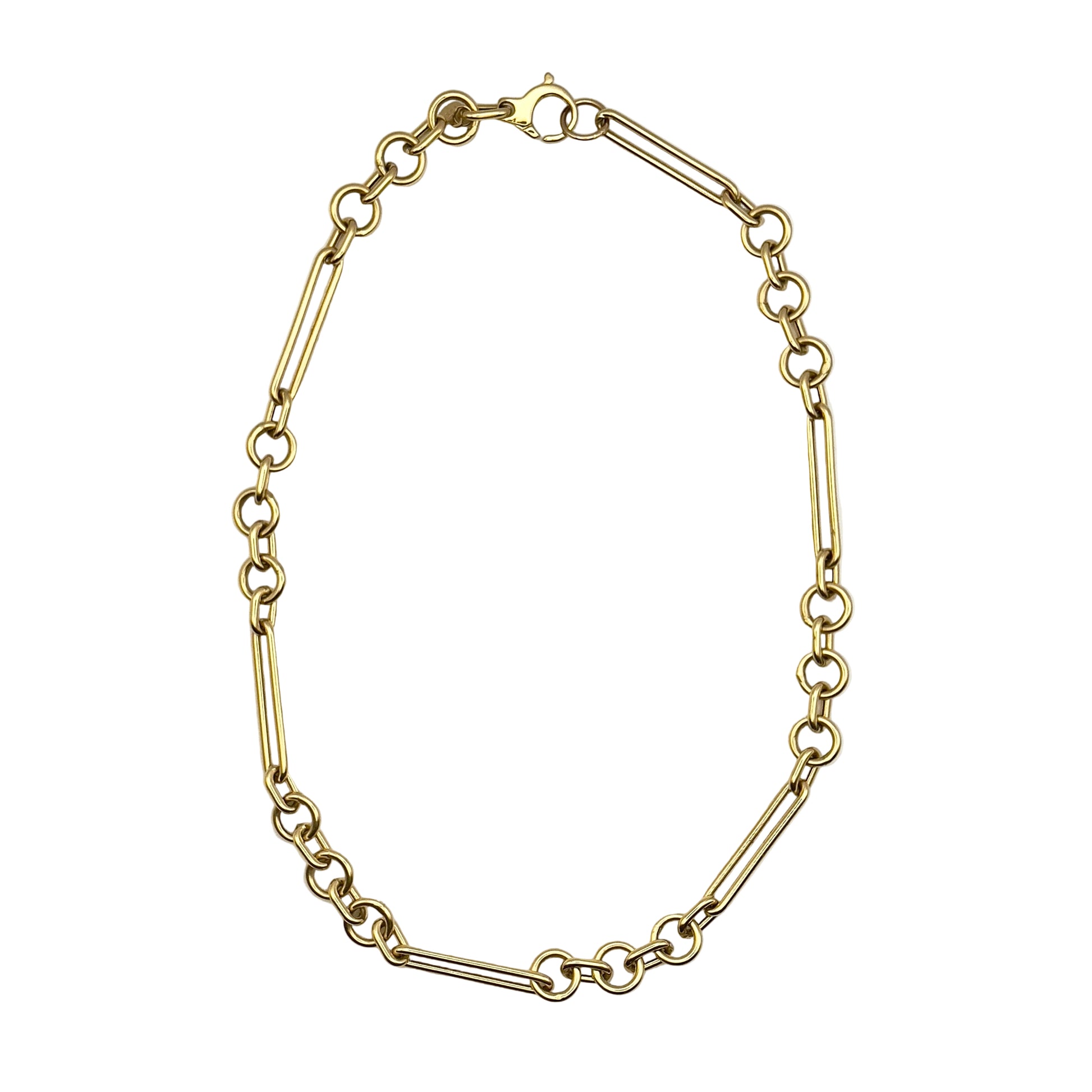 Gold chain bracelet on a white background