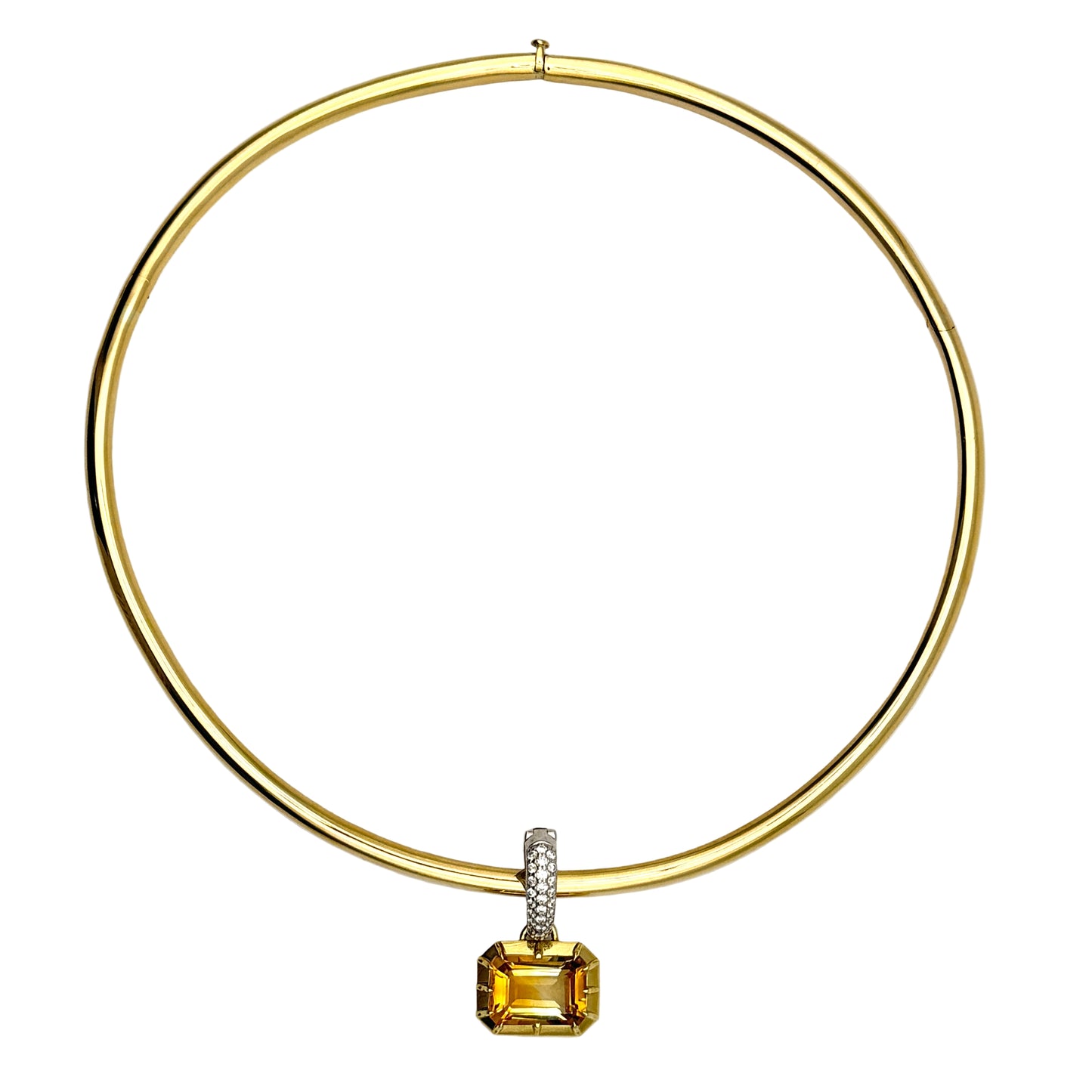 Gold necklace with a yellow gemstone pendant on a white background