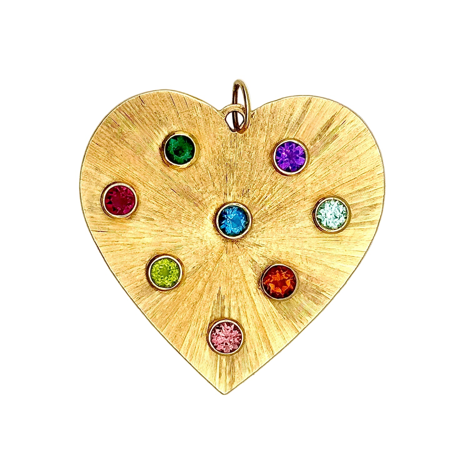 Gold heart-shaped pendant with colorful gemstones on a light gray background