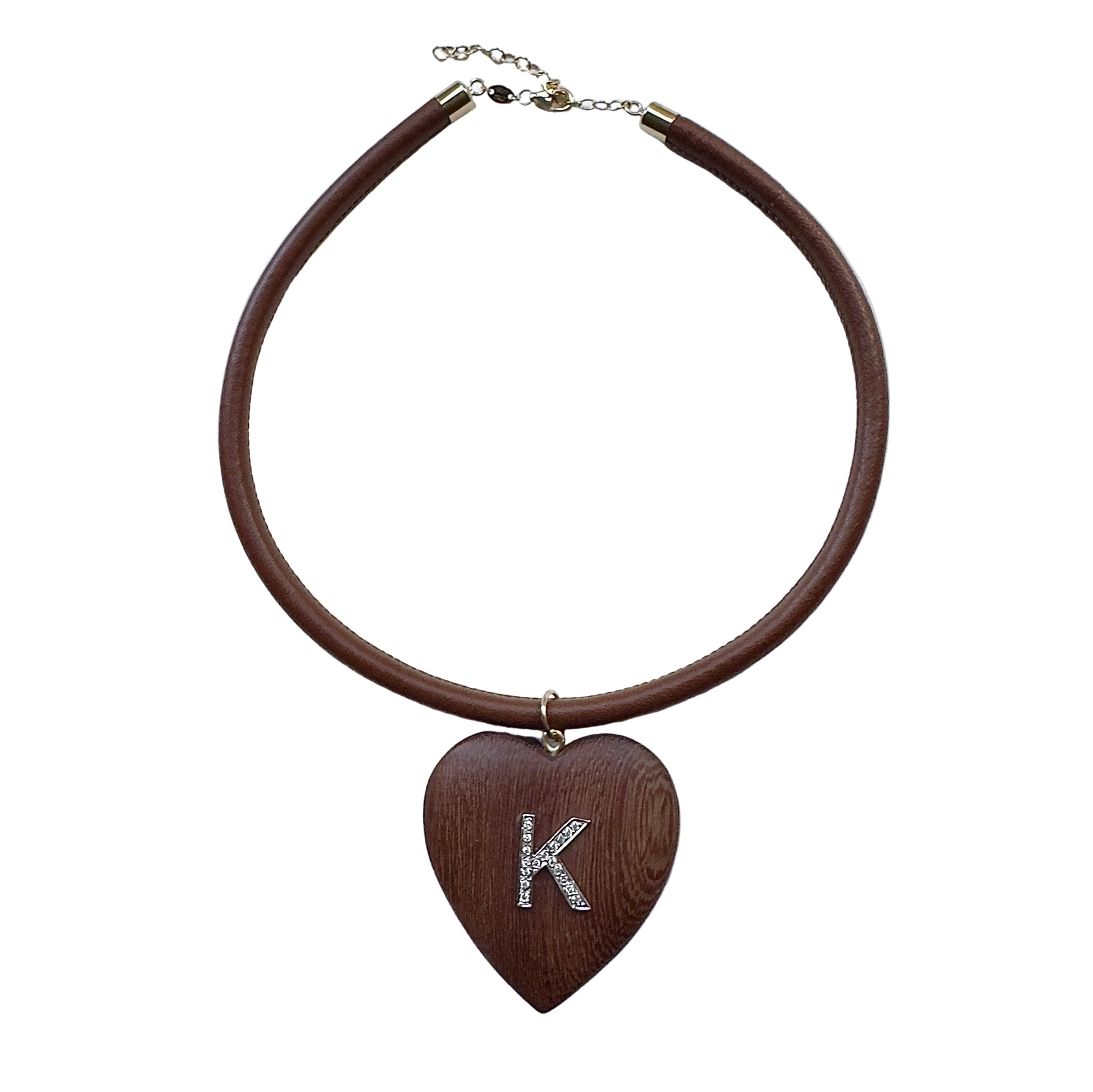 Brown leather necklace with a wooden heart pendant featuring the letter 'K' on a white background