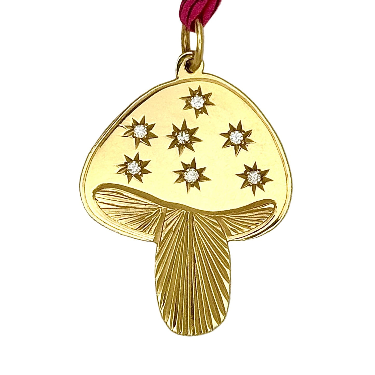 Mushroom shaped gold pendant with diamonds.