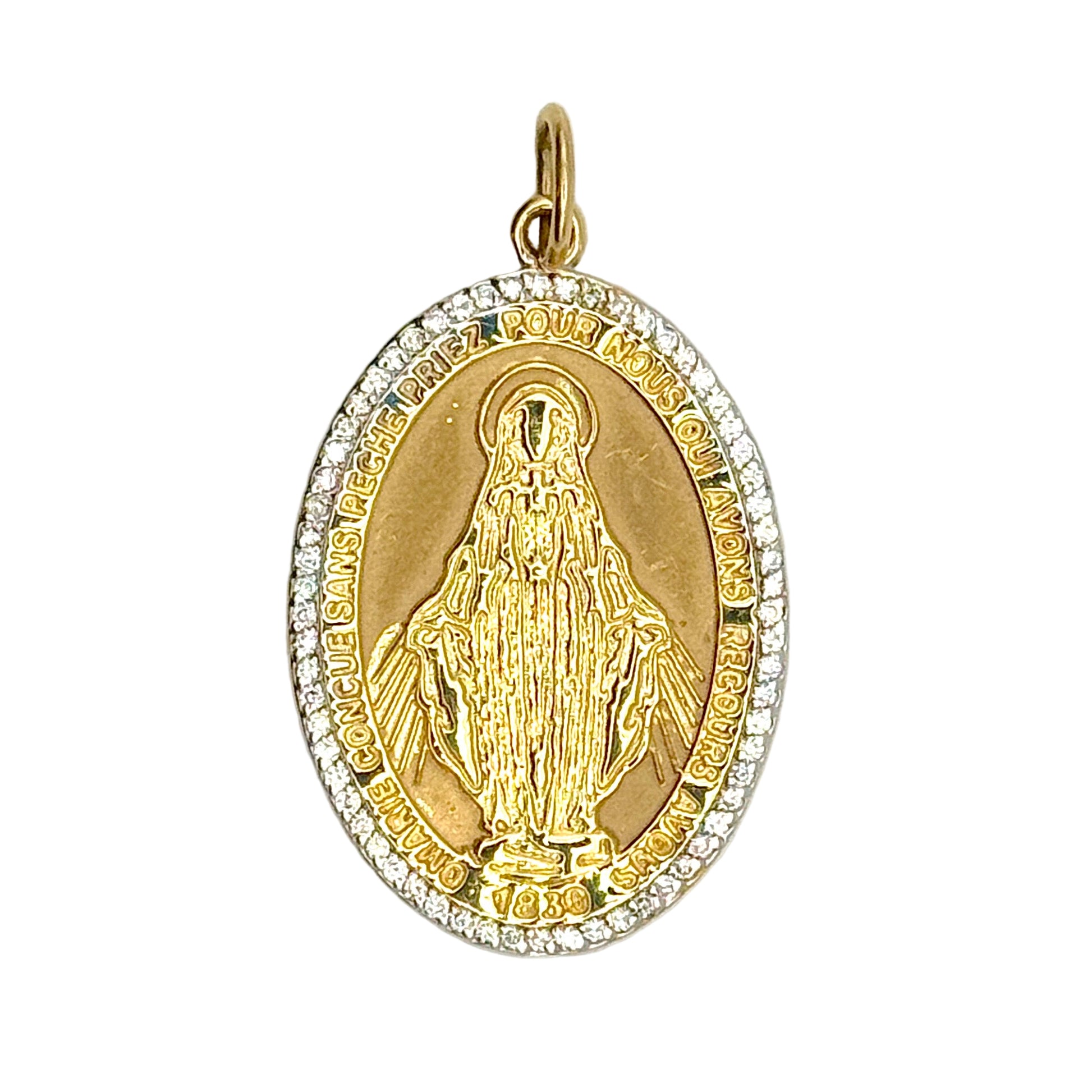 Gold pendant with religious design on a white background