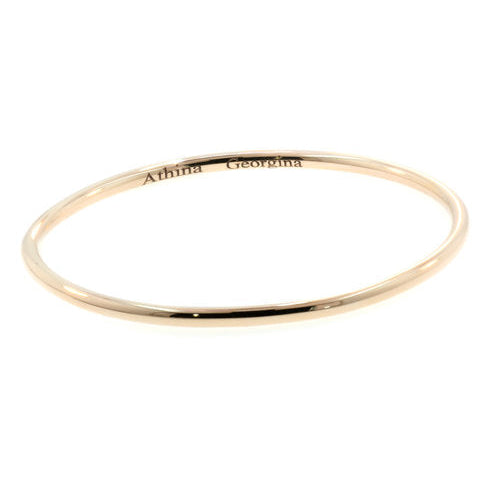 Ring bracelet with engraved letters on inside of band