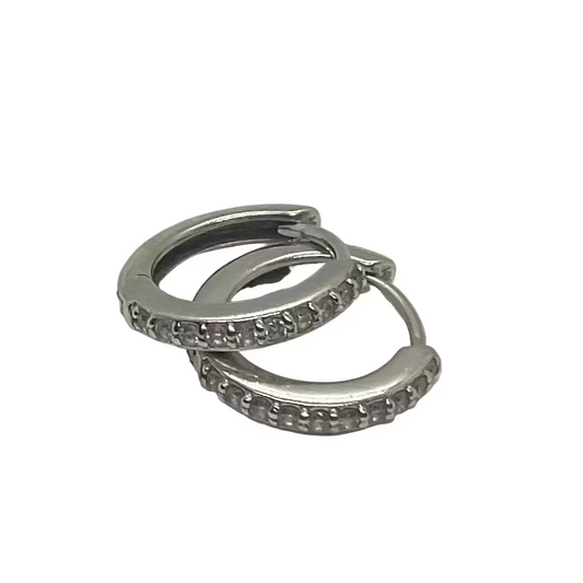 Pair of silver hoop earrings on a white background