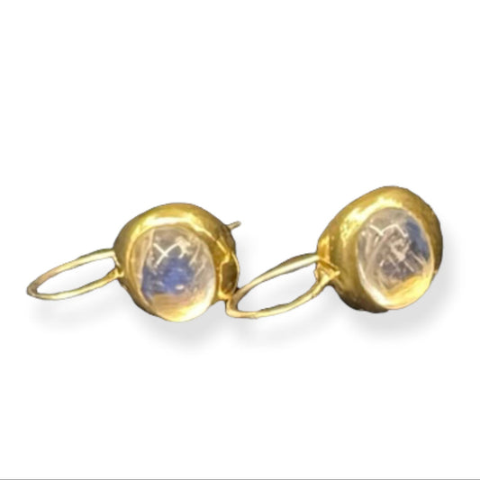 A pair of 22K gold hoop earrings with moonstone inlays.