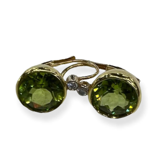 A pair of 18K gold-colored peridot earrings with a screw-back closure.