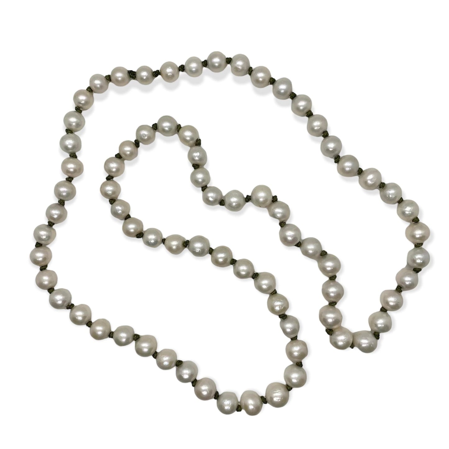 Pearl necklace with green knots on white background.