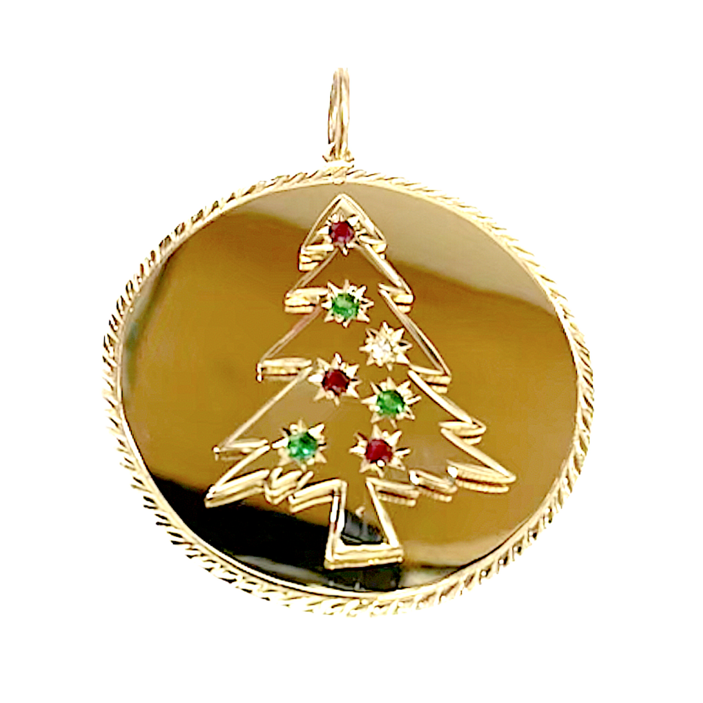 A gold pendant with a Christmas tree motif adorned with precious stones in red and green.