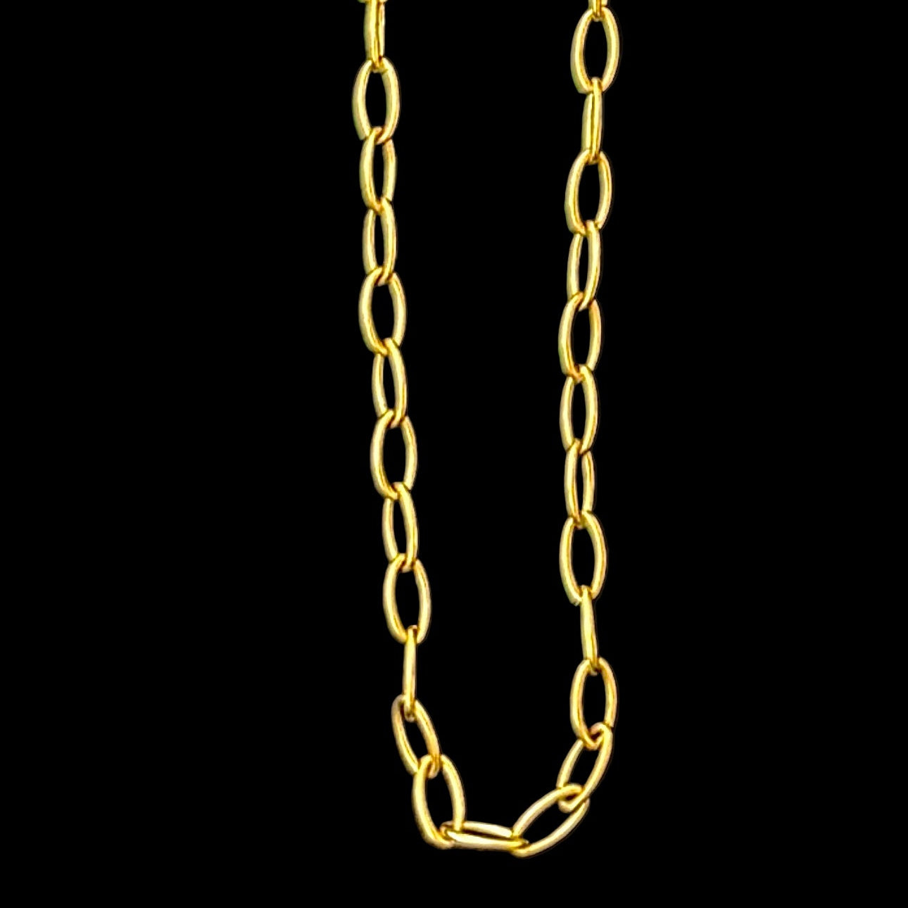 Gold chain on a black background 