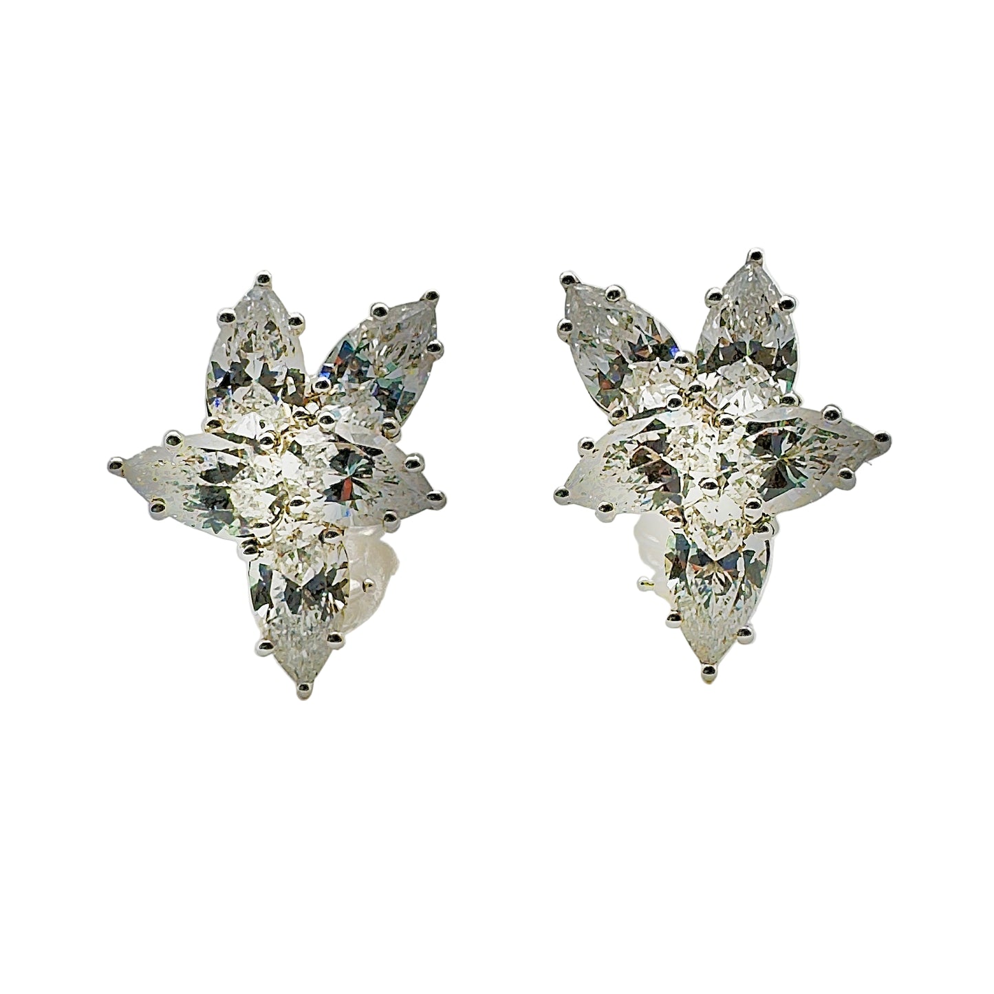 Pair of diamond earrings on a white background