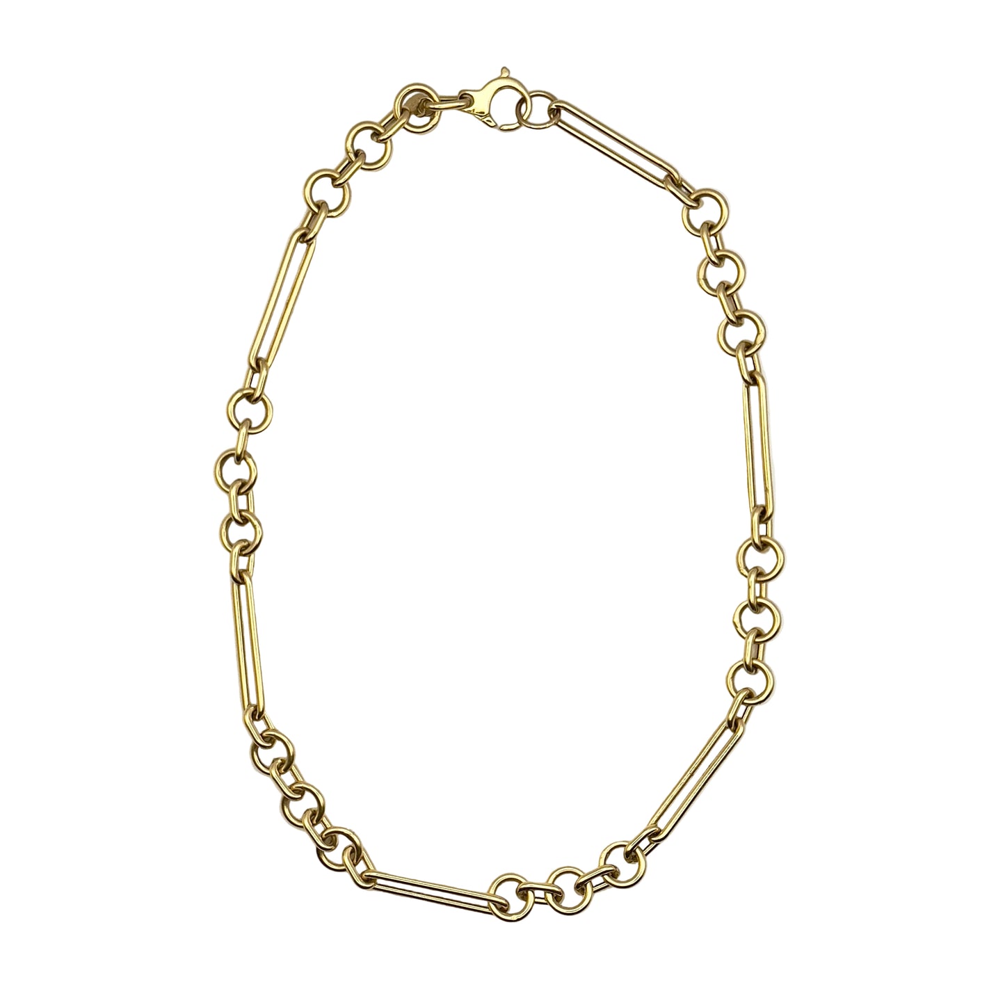Gold chain bracelet on a white background