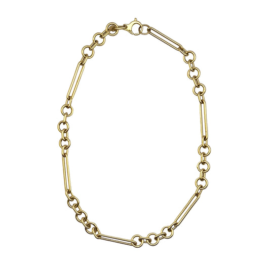 Gold chain bracelet on a white background