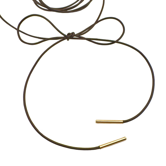 Necklace with gold ends on a white background
