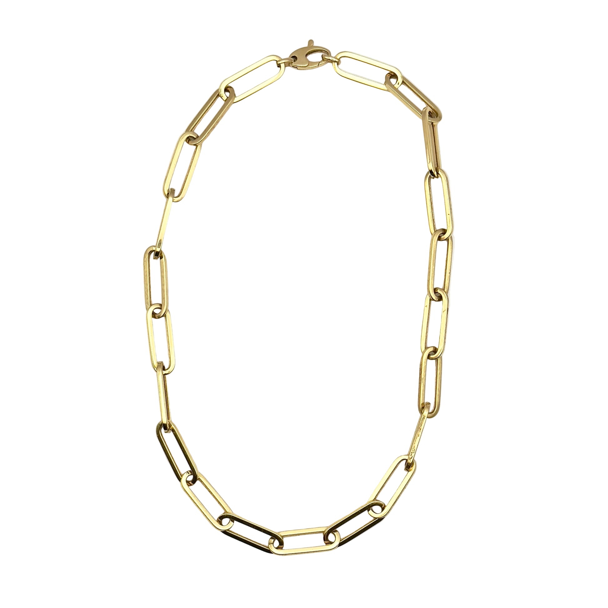 Gold chain necklace on a white background