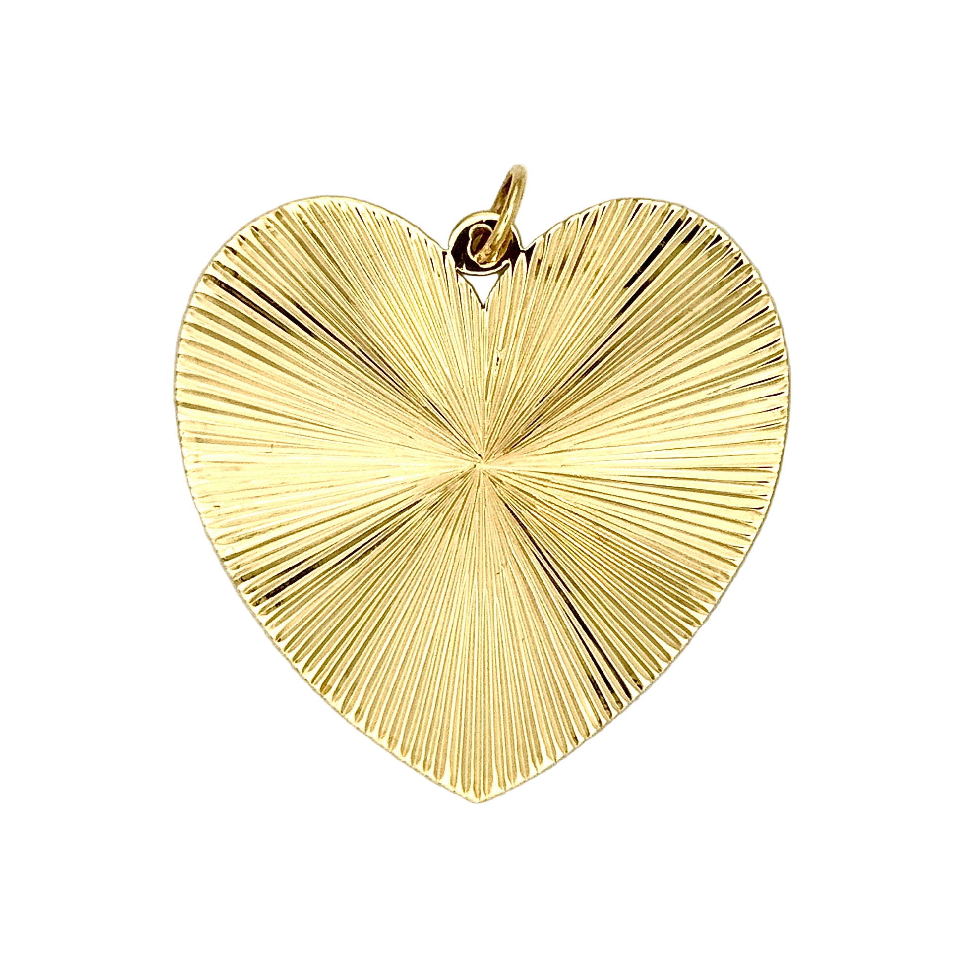 Gold heart-shaped pendant on a white background