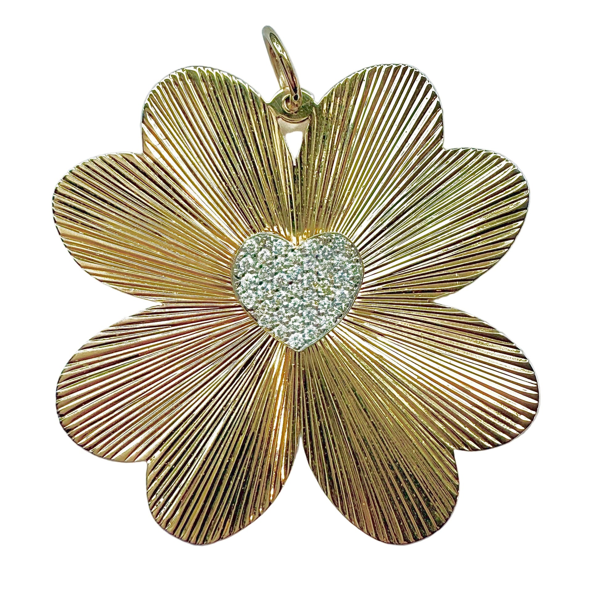Gold flower-shaped pendant with a heart centerpiece on a white background