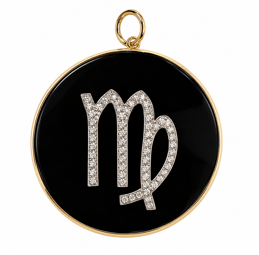 A circular pendant featuring a black onyx face with a silver-toned astrological symbol (Virgo) paved with small diamonds, framed by a polished gold border and top loop, on a white background.