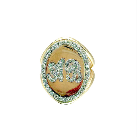 Gold ring with gemstones on a white background