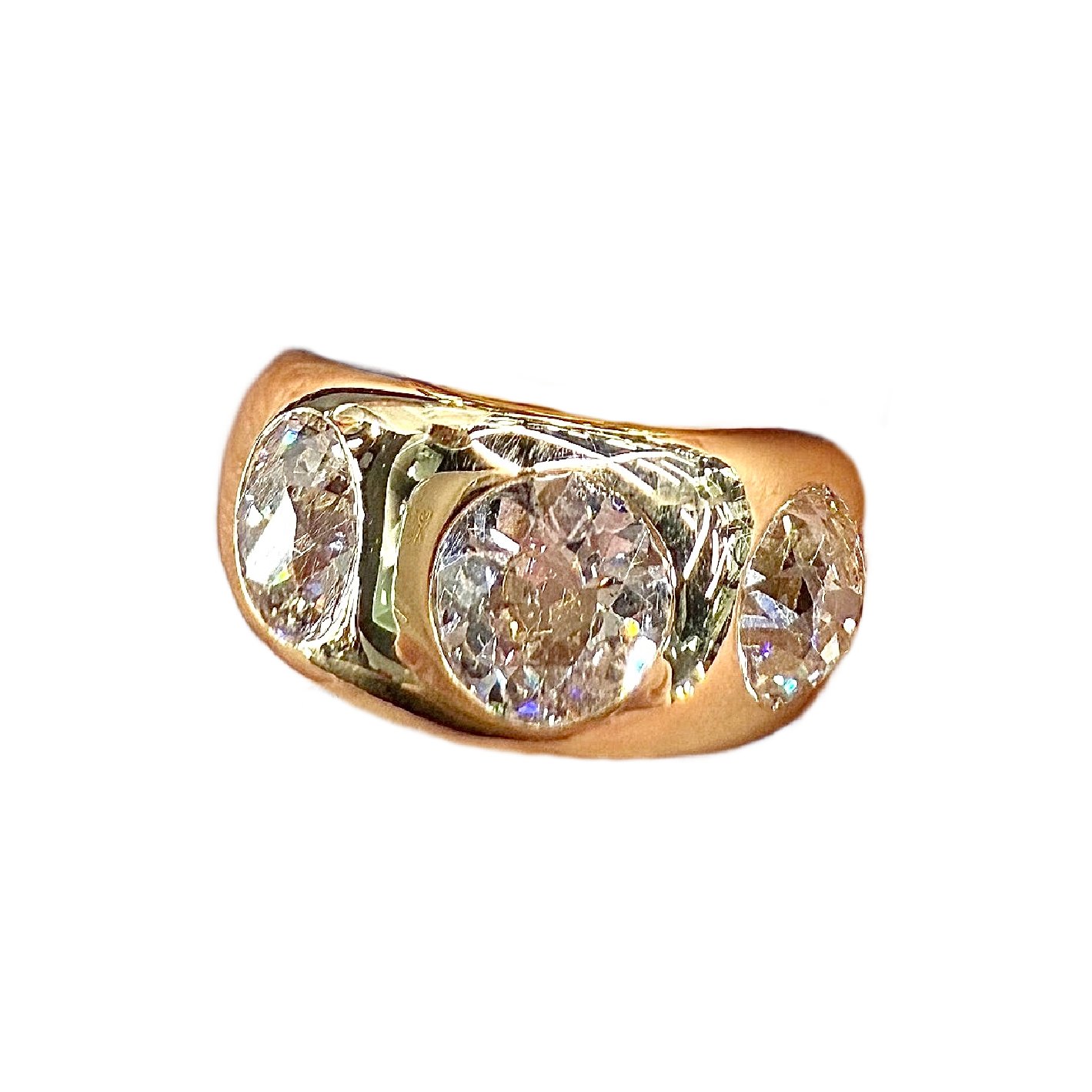 Gold ring with three diamonds on a white background