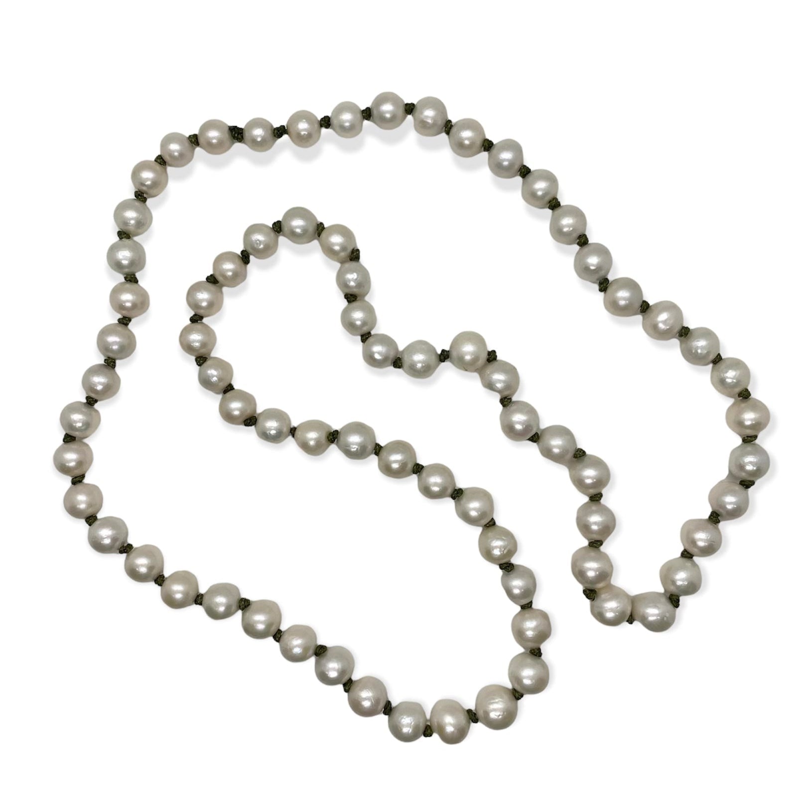 Pearl necklace with green knots on white background. 