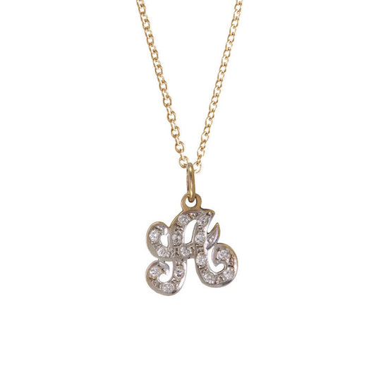 A 14K gold charm with a customizable letter or number on a chain, shown in yellow gold.