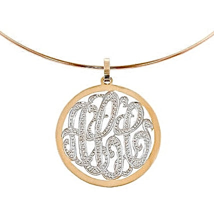 A 14k yellow gold framed multi initial diamond monogram pendant with block lettering, displayed on a chain.